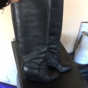 Black knee high Steve Madden boots